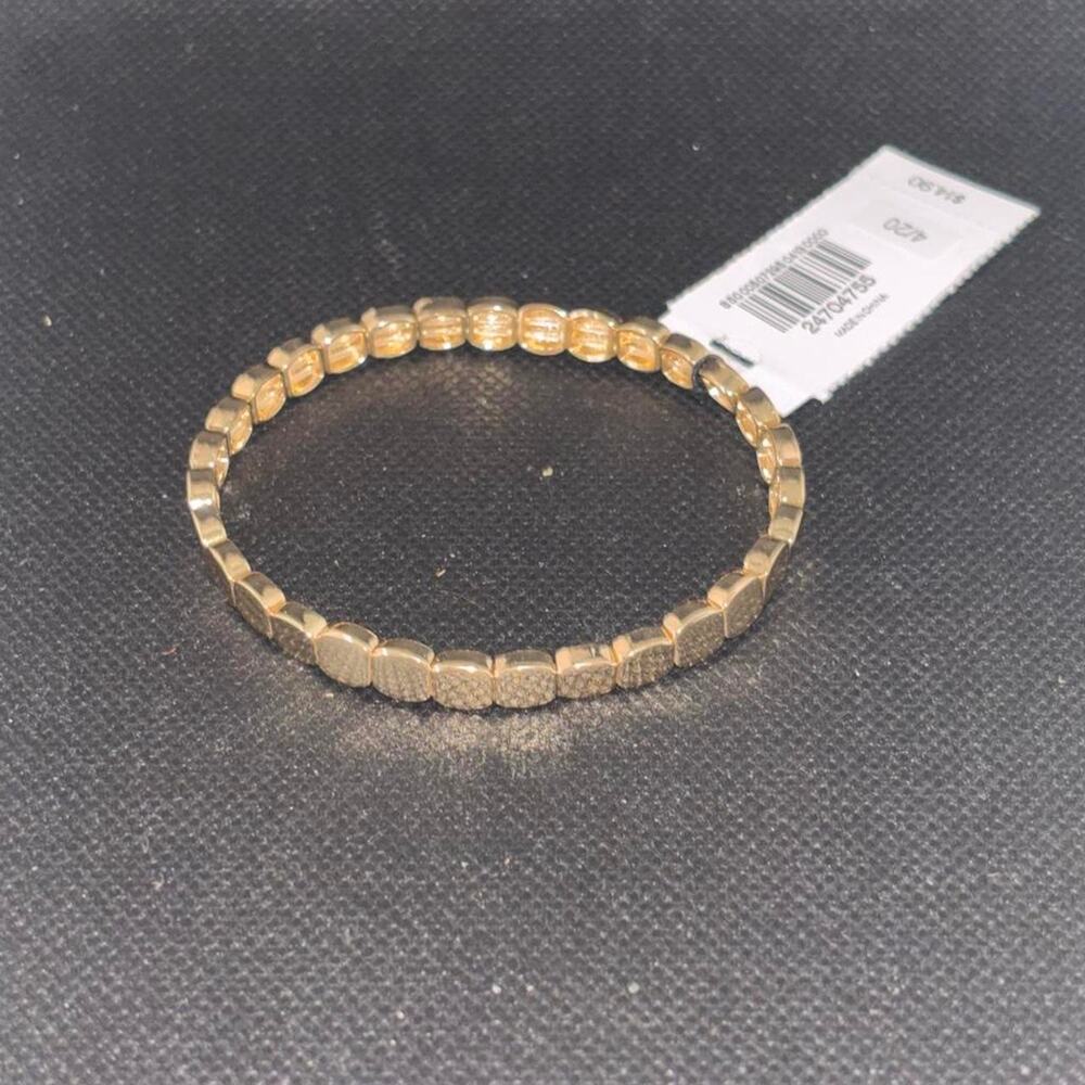 Gold bracelet with textured rectangular